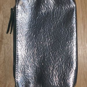 Small silver makeup bag